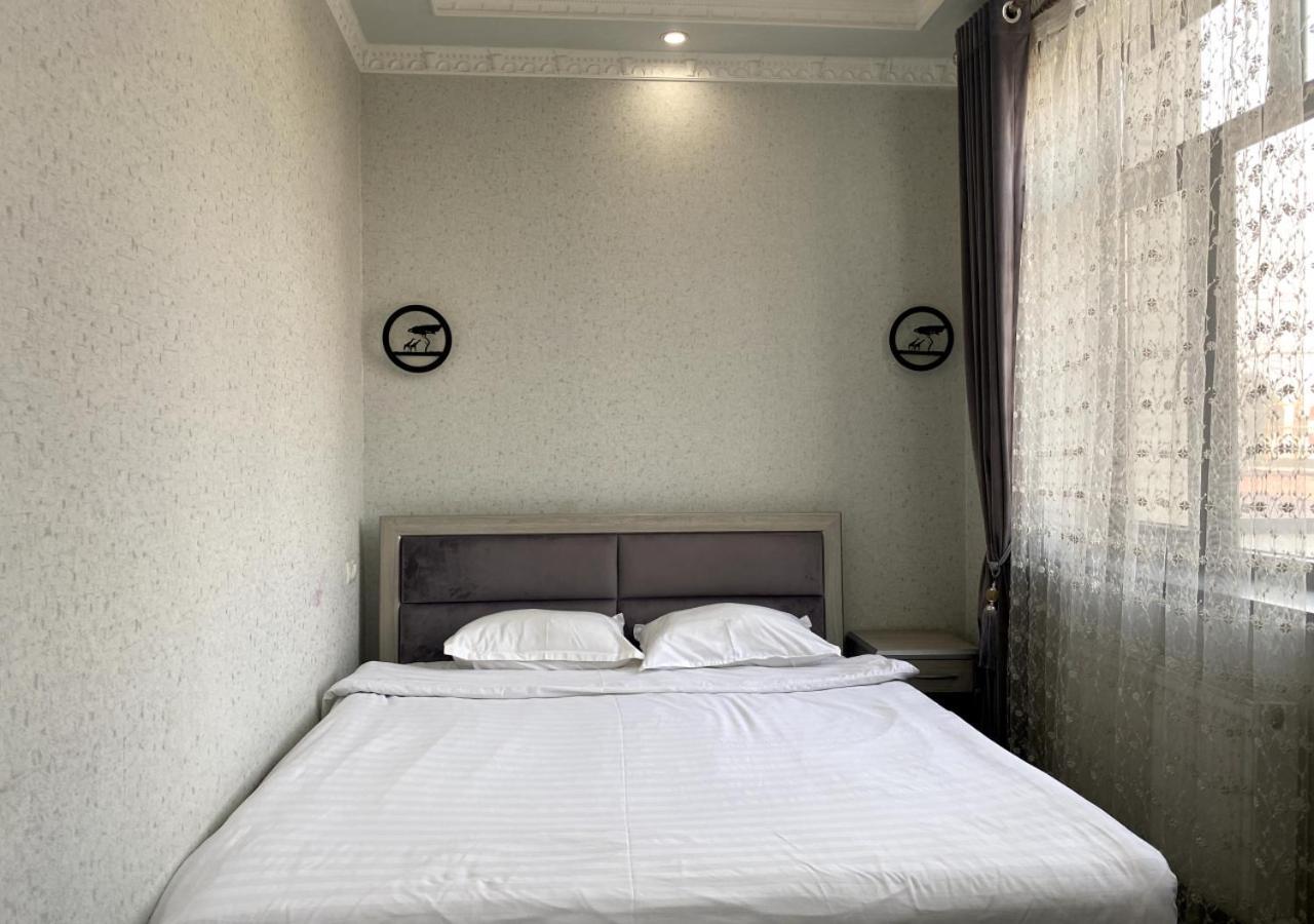 Diyor Hotel Marghilon Exterior foto